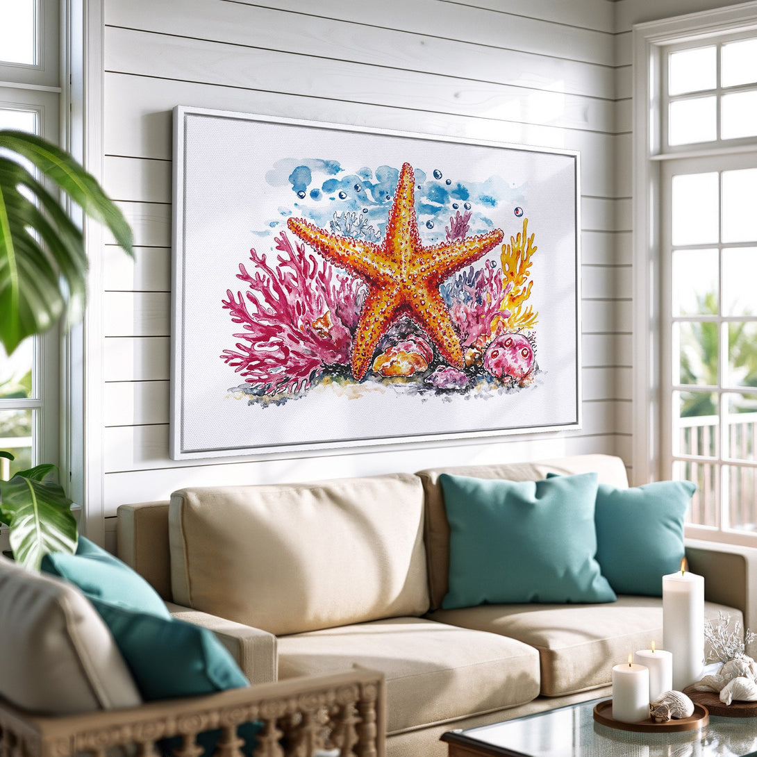 Framed Wall Art featuring a watercolor starfish and coral reef scene. Coastal decor with vibrant orange, pink, and blue hues. Perfect for beach house vibes.
