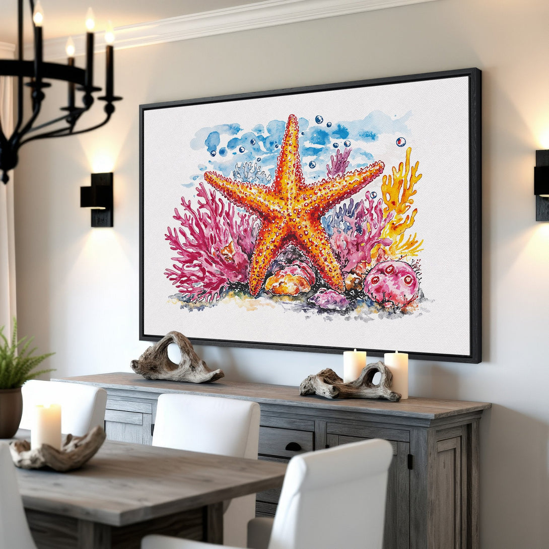 Framed Wall Art featuring a vibrant watercolor starfish and coral reef. Coastal decor in warm orange, pink, and blue hues. Perfect for a beachy home!