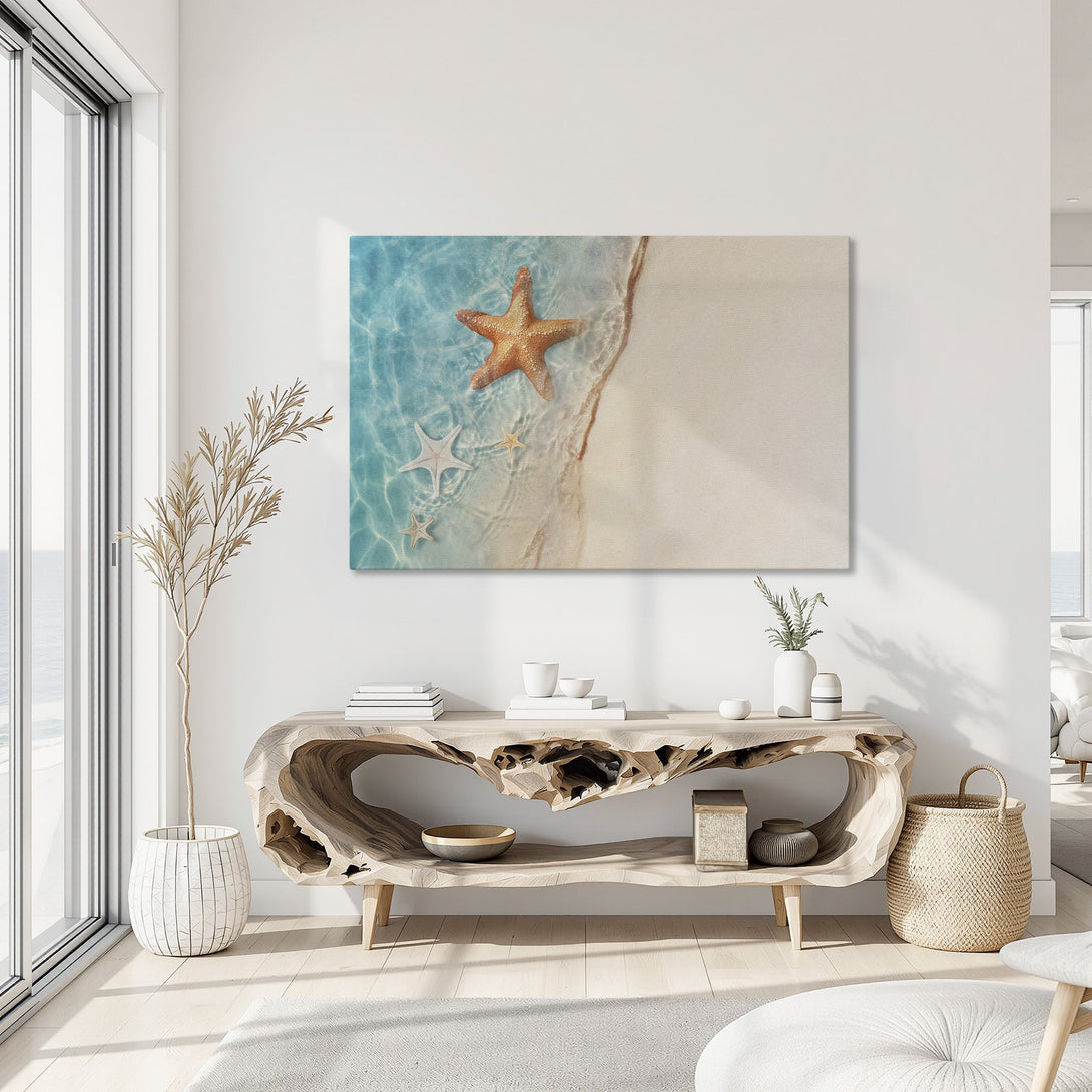 Framed Wall Art featuring a beach scene with starfish in a coastal style. Blue, beige, and orange color palette. Perfect for your home decor!