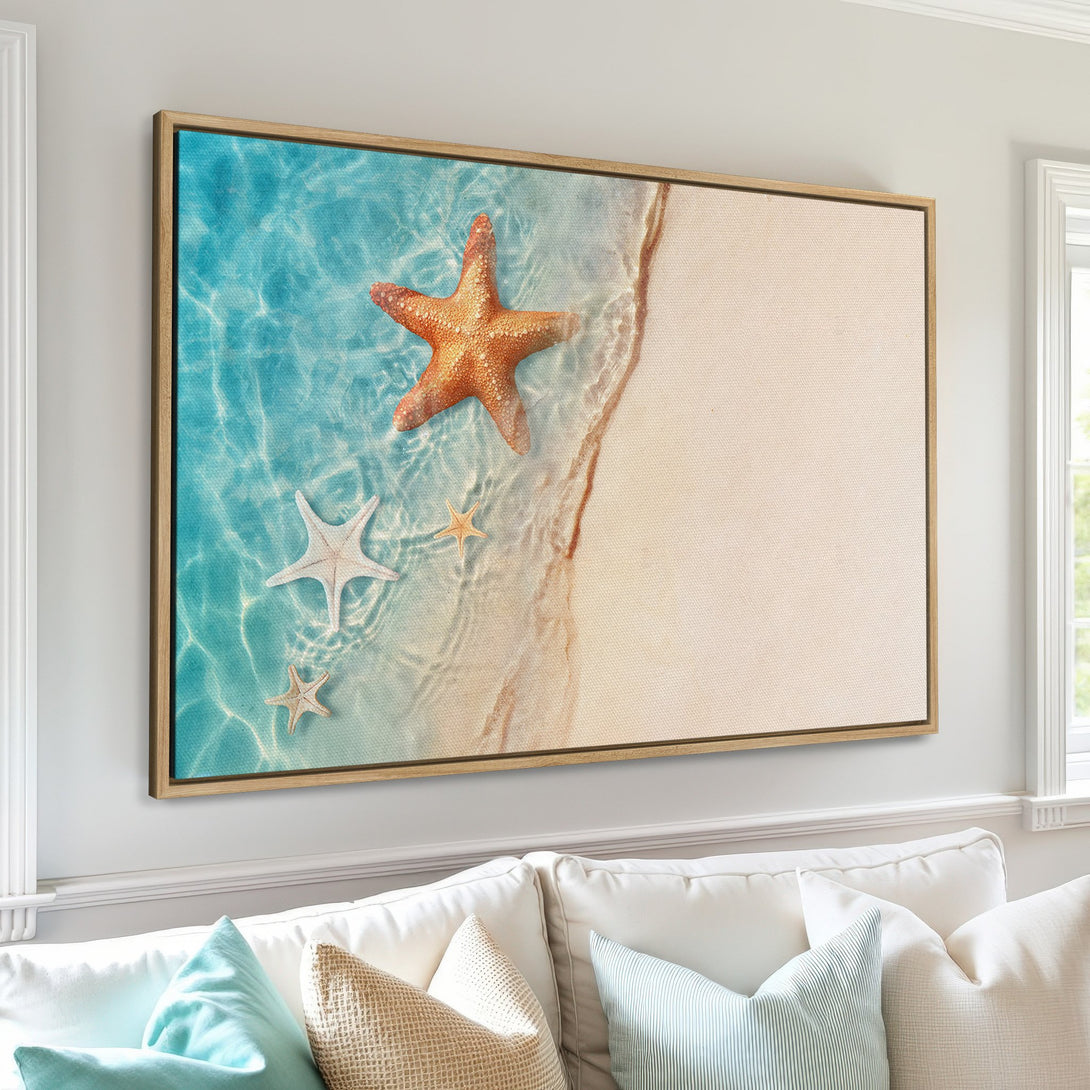 Canvas Print of starfish on a beach, serene coastal art. Blue, beige, and orange color palette, perfect for a relaxing living room.