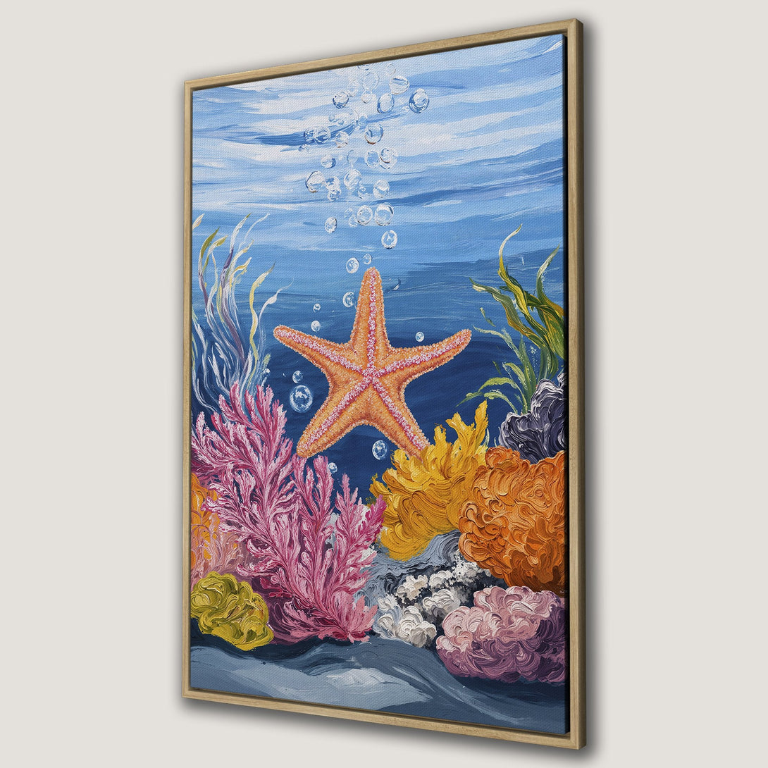Framed Wall Art of a vibrant underwater scene with a starfish, coral, and bubbles. Colorful ocean art in blues, oranges, and pinks. Perfect coastal decor.