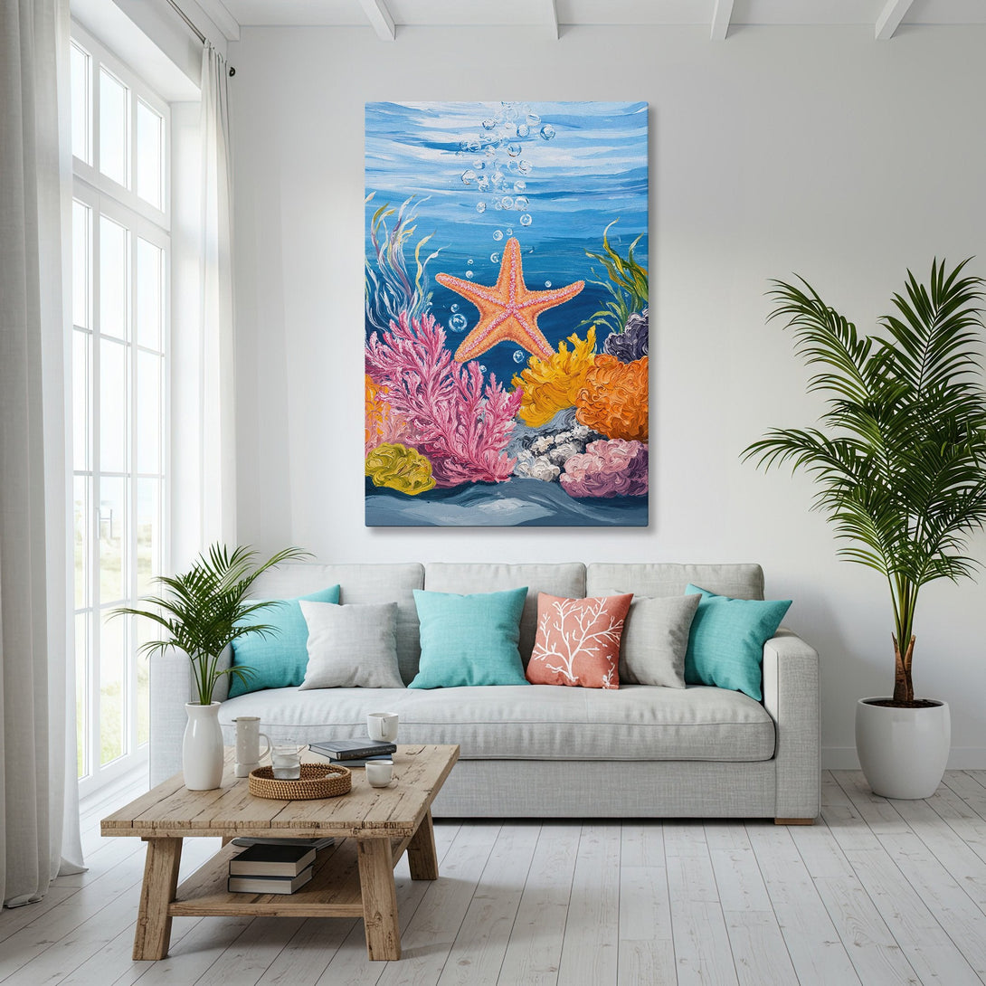 Framed Wall Art featuring an underwater scene with a starfish, coral, and bubbles. Coastal style with blue, orange, and pink color palette. Perfect for beach house decor.