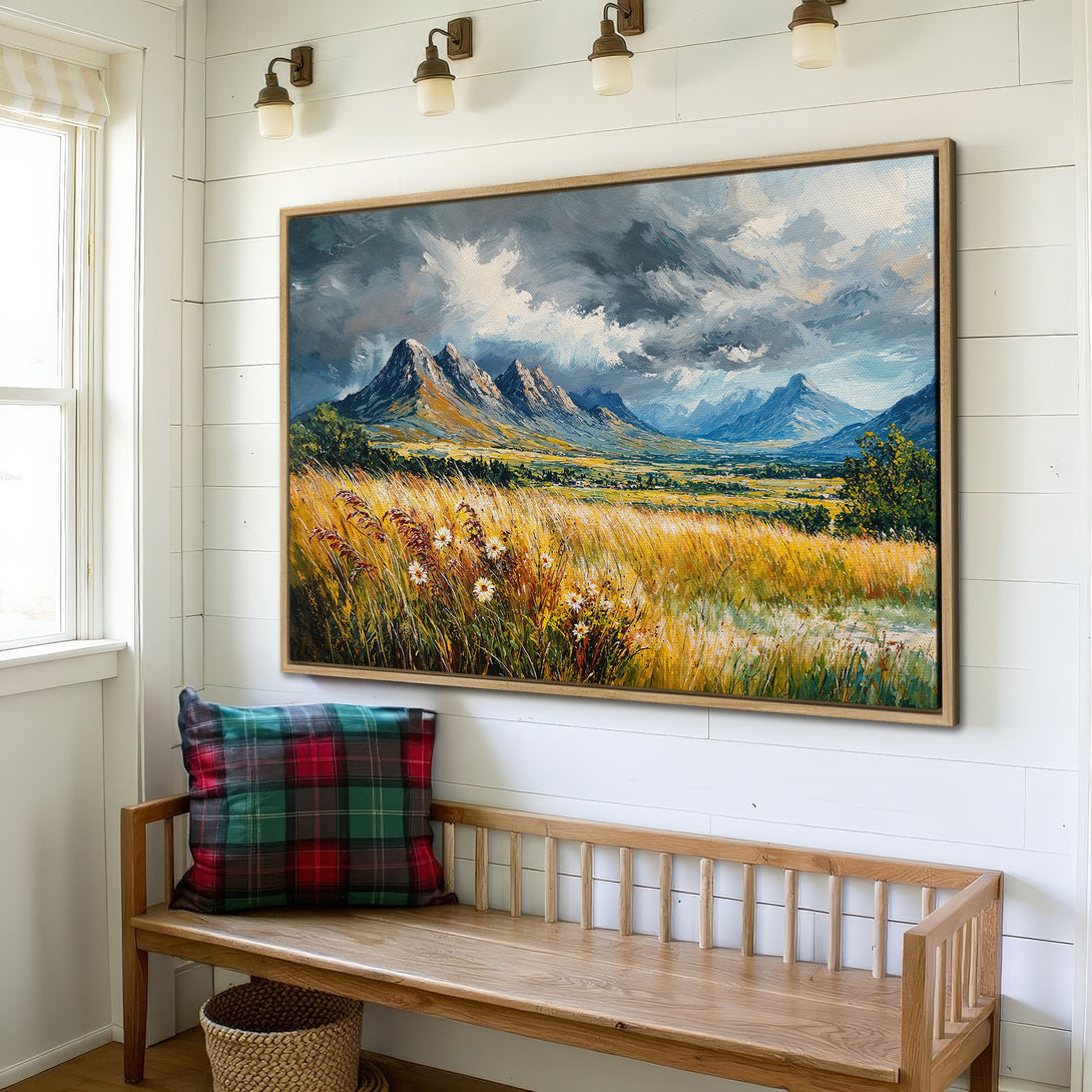 Framed Wall Art: Stunning landscape Canvas Print with mountains, fields, and dramatic sky. Warm yellow, blue, and gray color palette. Perfect for adding art to your home.
