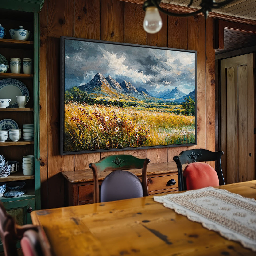 Framed Wall Art: Landscape painting with mountains & field in a rustic interior. Earthy tones & moody sky create a calming atmosphere. Perfect home decor.