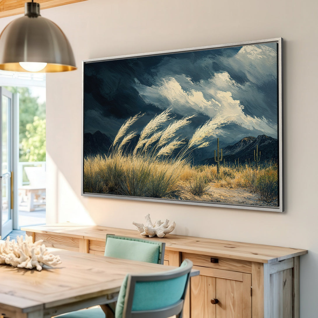 Framed Wall Art: Dramatic desert landscape canvas print with moody blue, white, and gold tones. Perfect for adding a touch of nature to your space.