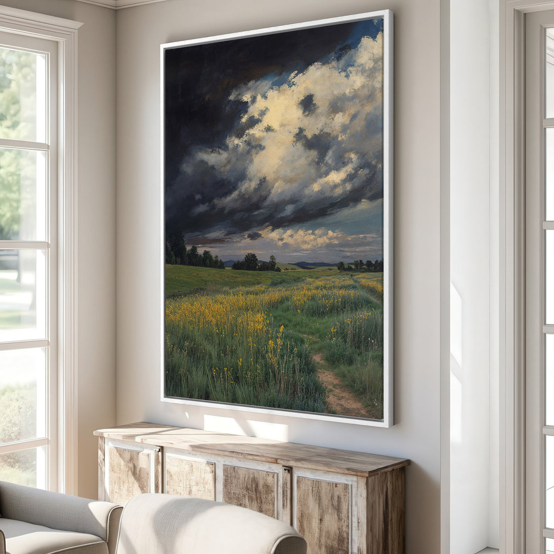 Framed Wall Art: Dramatic landscape Canvas Print with moody sky, yellow flowers, and green fields. Earthy tones for a calming interior.