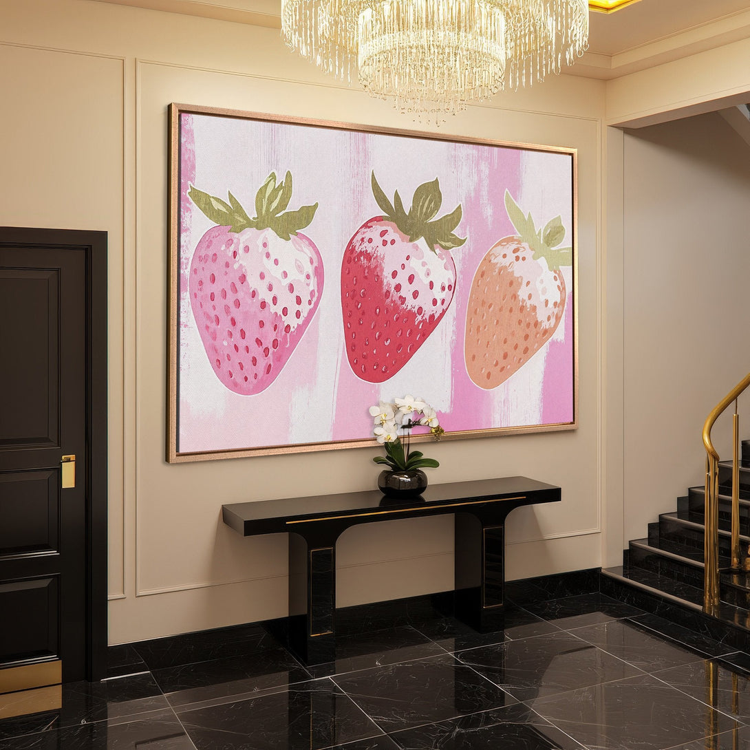 Framed Wall Art: Pink strawberry canvas print in a modern entryway. Pop art style with pink, red, and green color palette. Elevate your home decor!