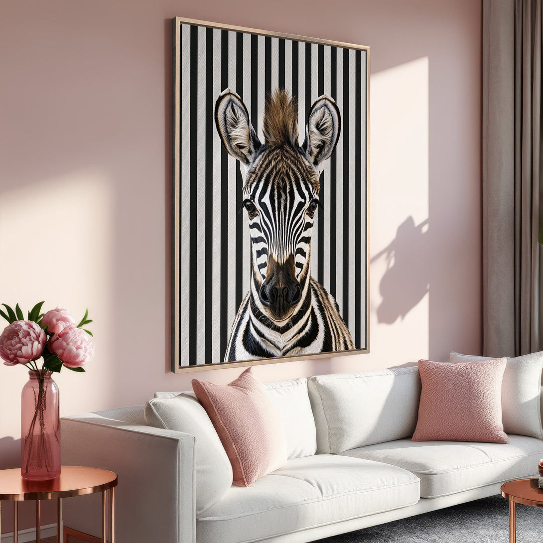 Framed Wall Art featuring a zebra portrait with a black and white striped background. Modern decor in a blush and neutral color palette. Elevate your space!