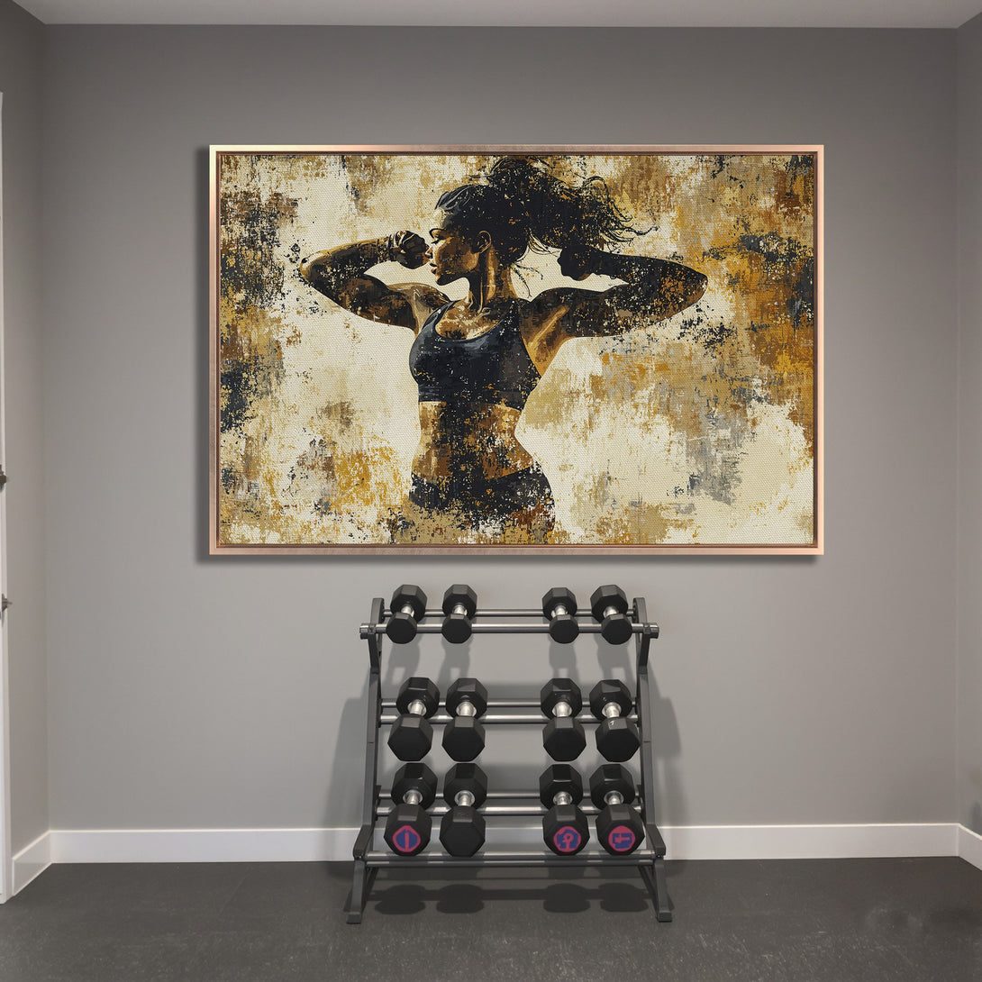 Framed Wall Art: Abstract canvas print of a woman flexing in a gym. Earthy tones of gold, black, and white. Perfect for home gym decor.