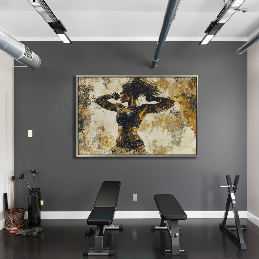 Framed Wall Art featuring a strong woman in abstract style with a gold and black color palette, perfect for home gym decor.