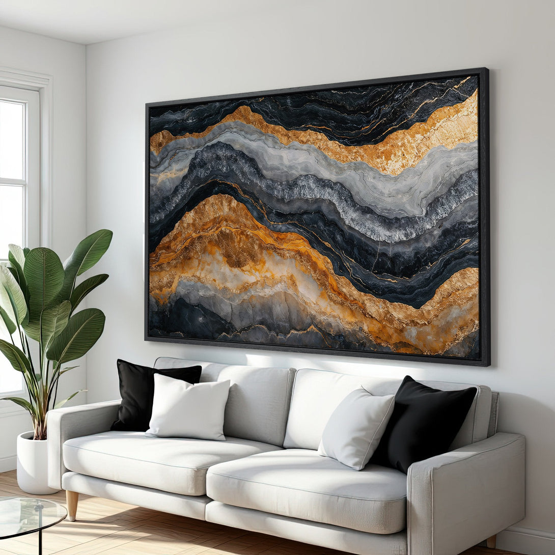 Framed Wall Art: Abstract gold, black, and gray canvas print. Modern art piece with a luxurious, layered design. Perfect for living room decor.