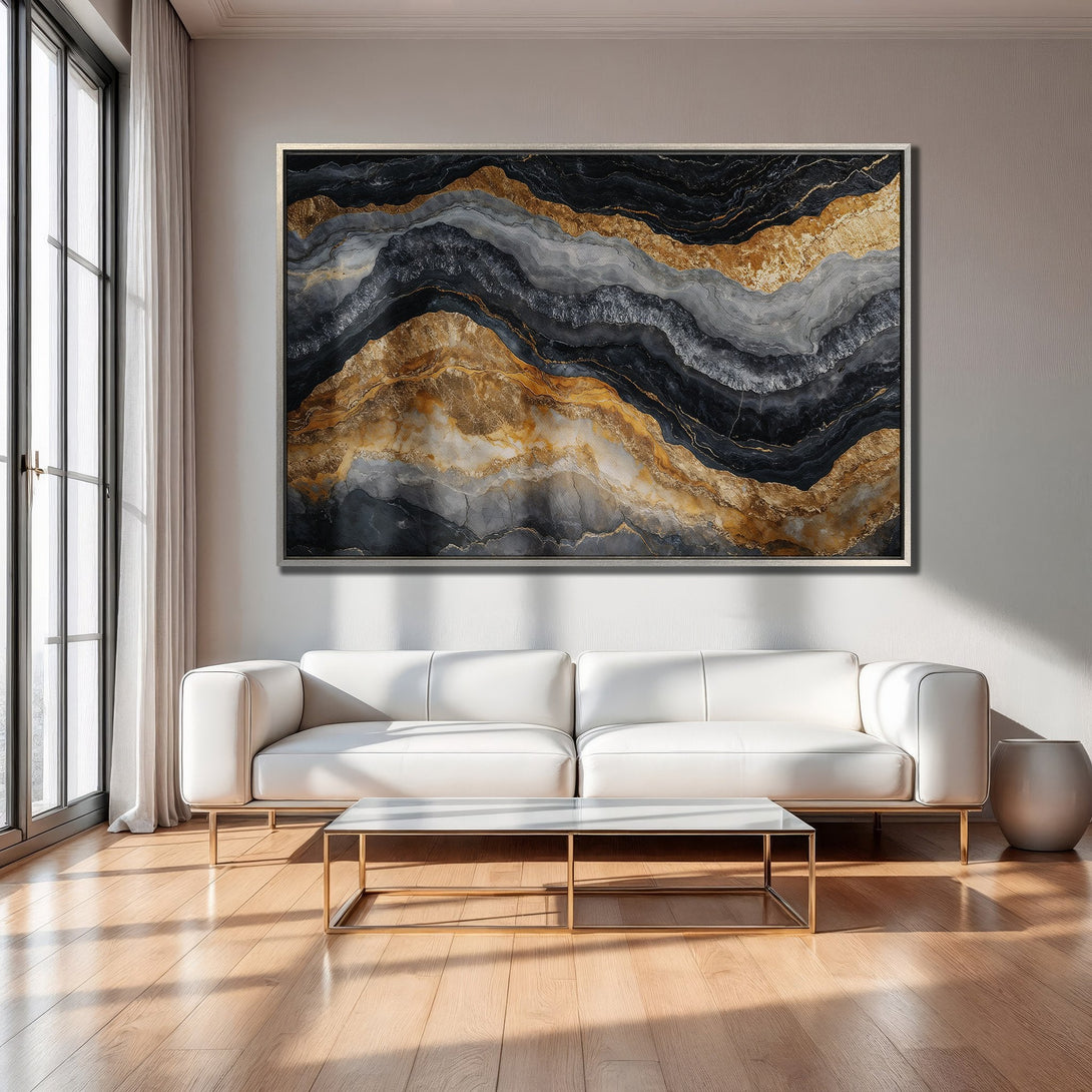 Framed Wall Art: Abstract gold, black, and gray canvas print. Modern art decor in a minimalist living room setting. Luxurious interior design.