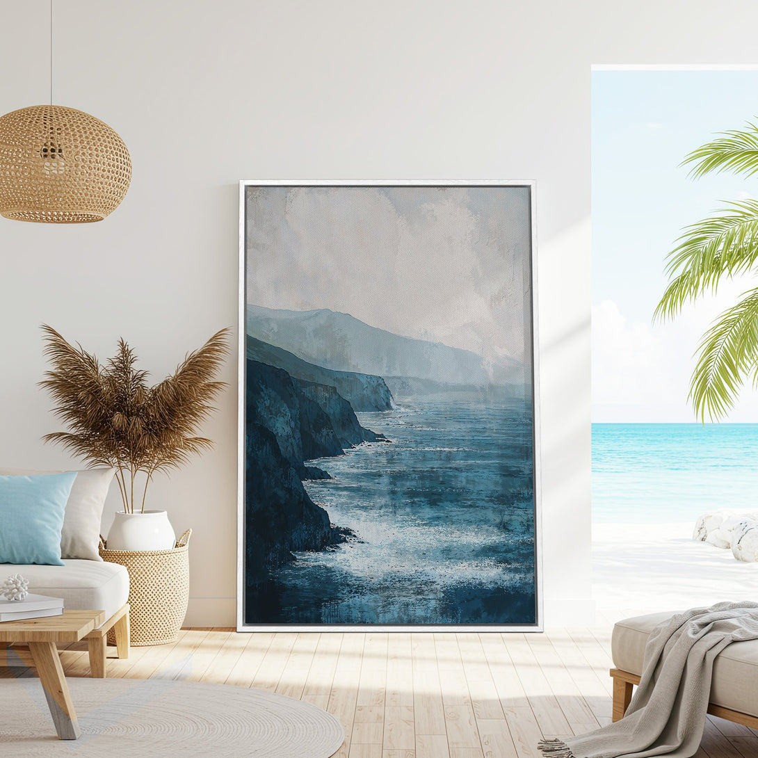 Framed Wall Art featuring a coastal landscape painting in blue and gray tones. Modern art perfect for beach house decor.