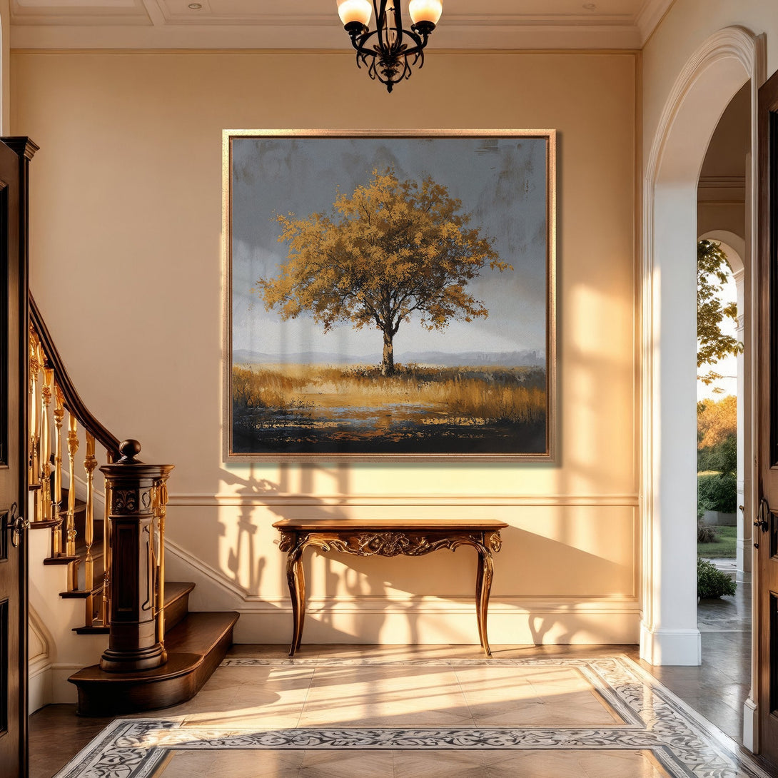 Framed Wall Art of a golden tree in a serene landscape. Warm, earthy tones create a calming atmosphere. Perfect for adding elegance to your home.