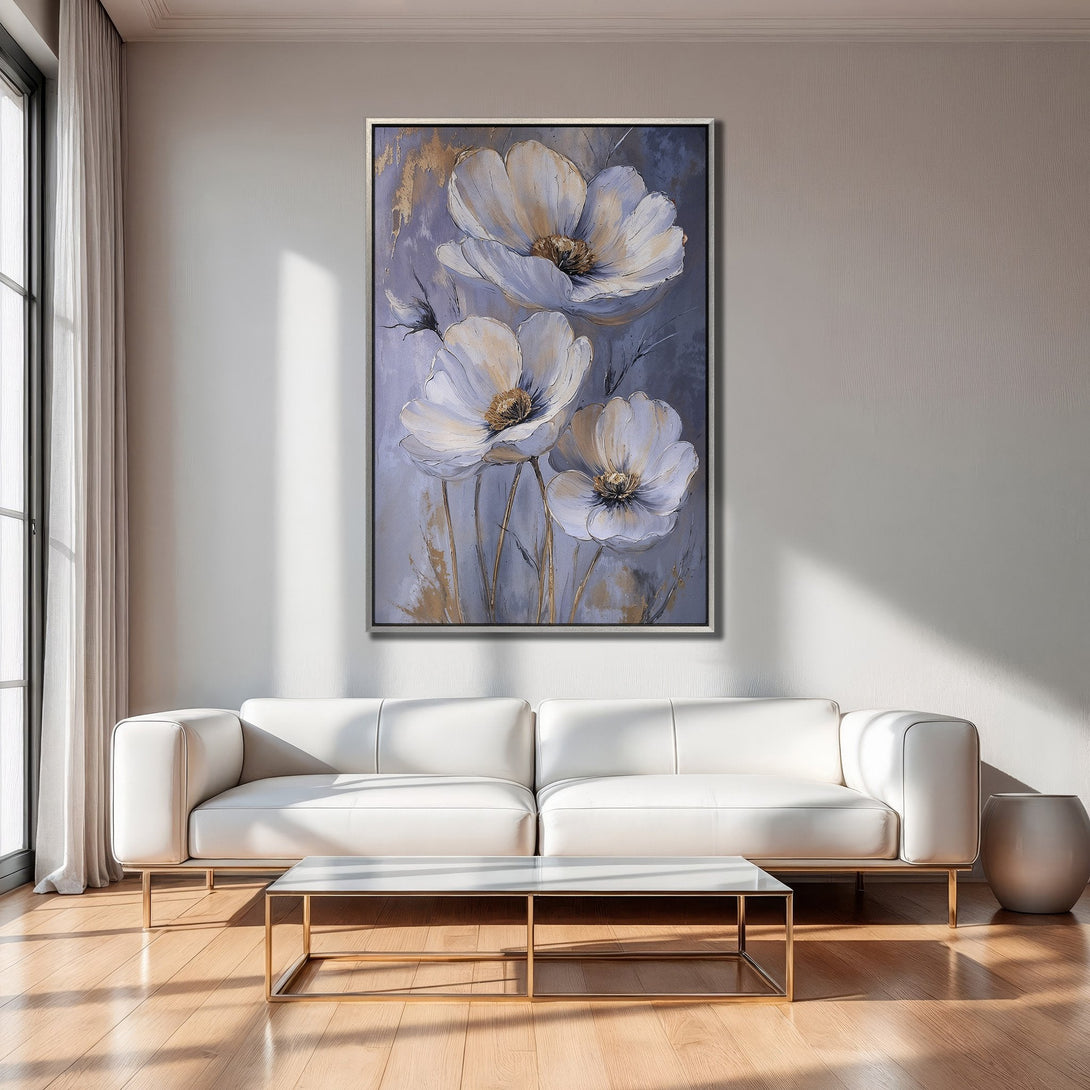Framed Wall Art featuring elegant white floral painting with gold accents, displayed in a modern interior. Soft, neutral color palette for a calming aesthetic.