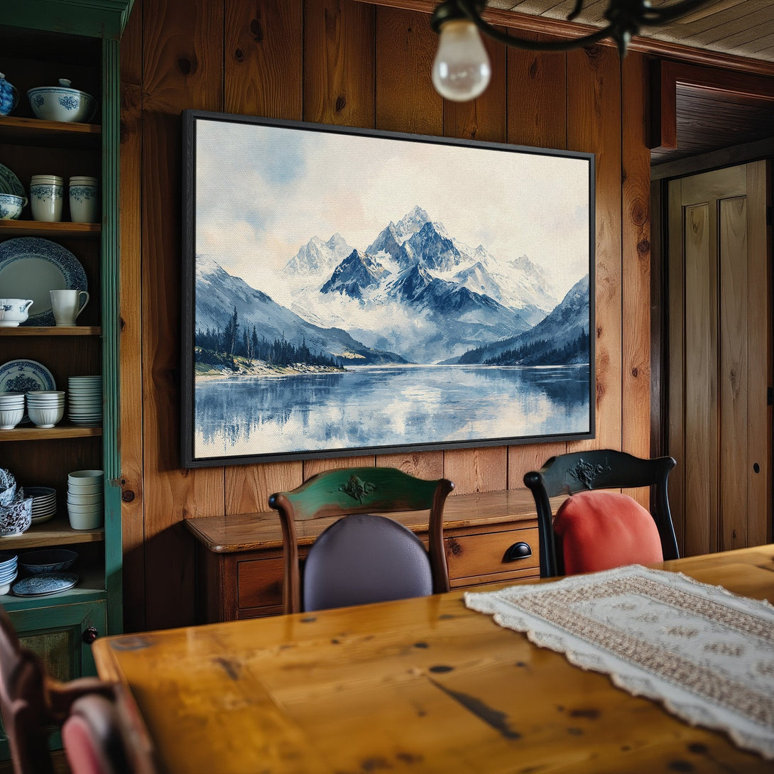 Framed Wall Art: Mountain landscape Canvas Print in blue and white, adding a serene touch to a rustic dining room.