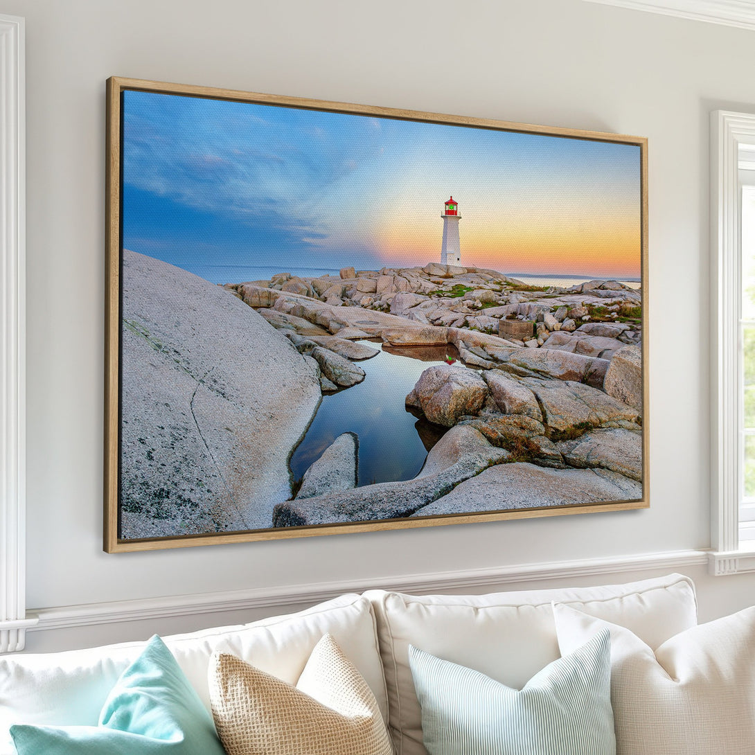 Framed Wall Art of a lighthouse at sunset. Coastal landscape Canvas Print with warm sunset colors and cool blues. Perfect for your home decor.