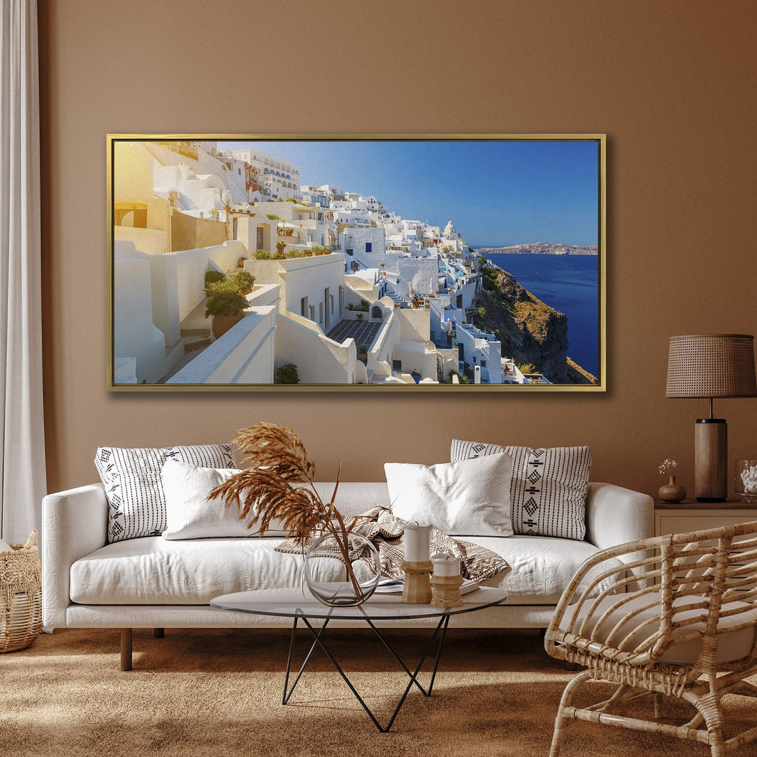 Canvas Print of Santorini, Greece. Capture the beauty of white buildings & blue sea with this stunning wall art. Perfect for coastal decor!