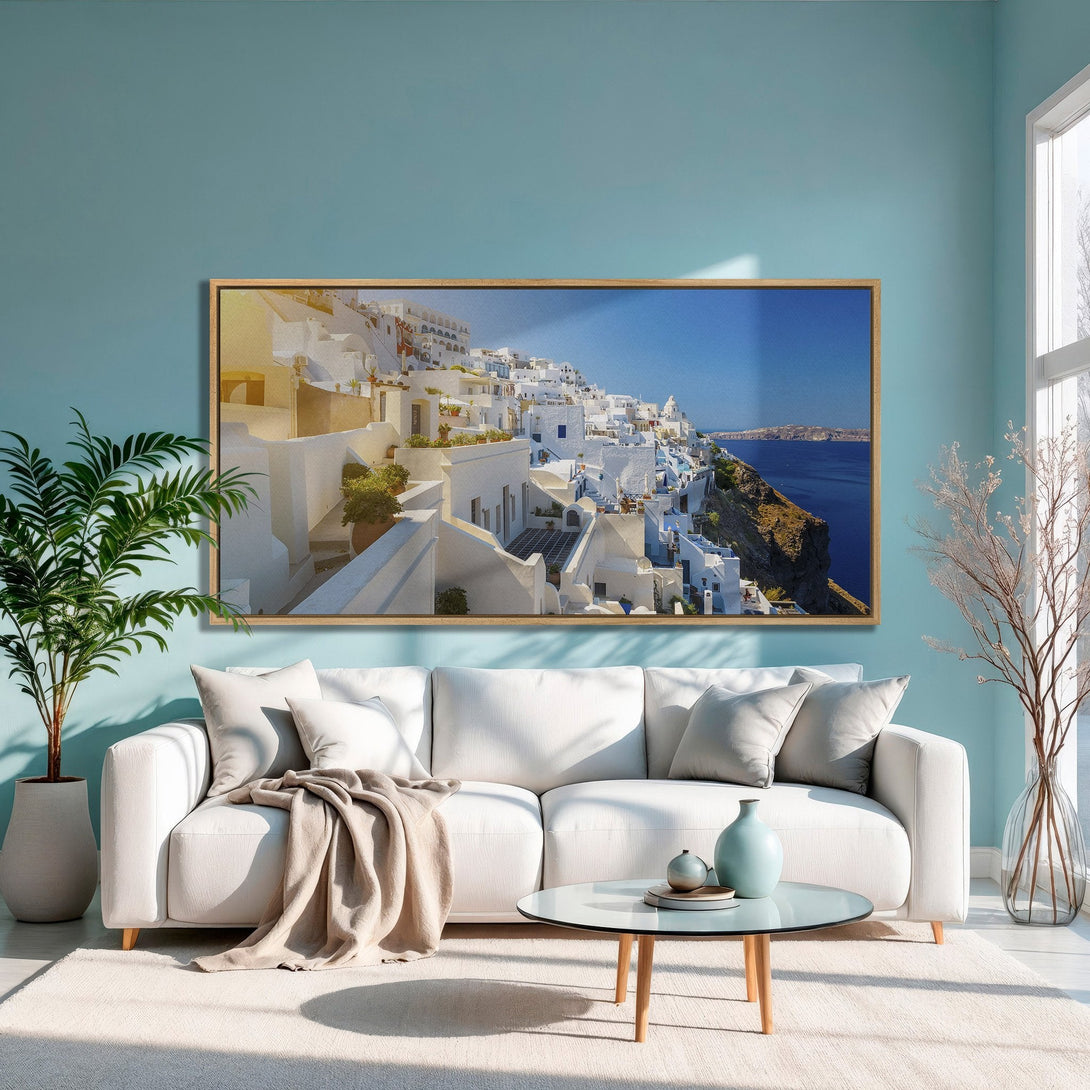 Framed Wall Art featuring Santorini architecture in a vibrant blue & white color palette. Bring the beauty of Greece home with this stunning canvas print!