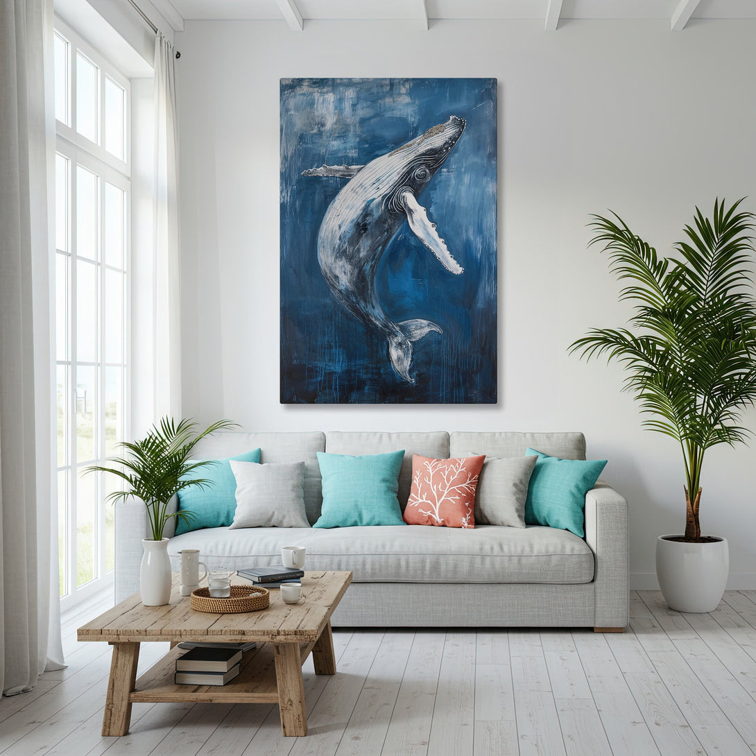Framed Wall Art featuring a majestic whale in a blue and white color palette. Coastal-inspired art for a serene living space.