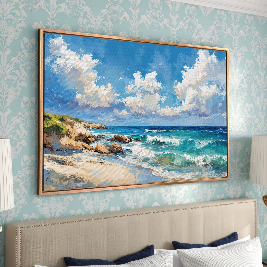 Framed Wall Art Canvas Print of a beach scene, featuring blue and turquoise ocean waves under a bright blue sky with white clouds. Coastal art for home decor.