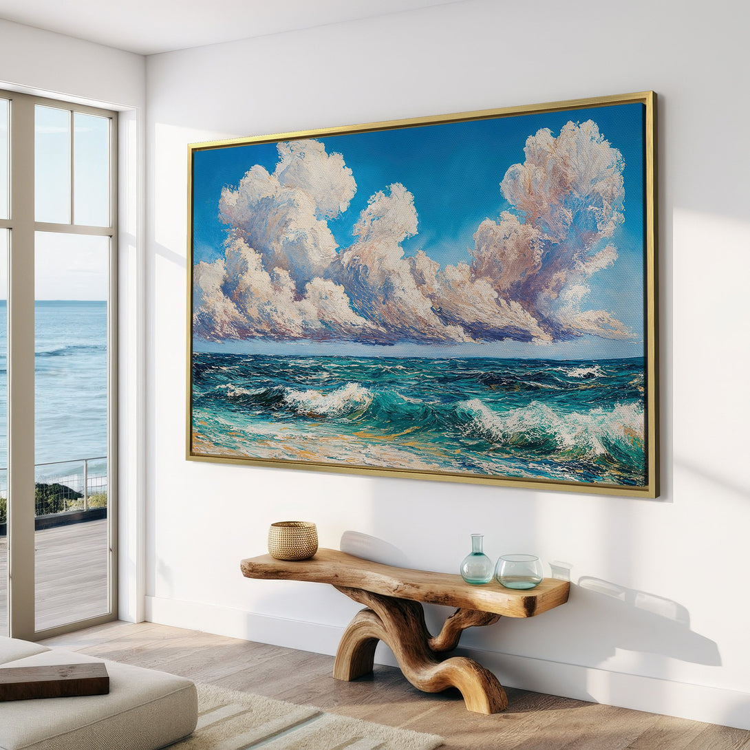 Canvas Print of a seascape with dramatic clouds & turquoise water. Coastal art in a bright, airy interior. Blue, white, and teal color palette.