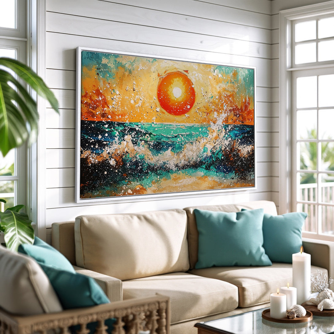 Framed Wall Art: Abstract ocean sunset canvas print with orange, teal, and yellow hues, displayed in a bright, coastal-style living room.