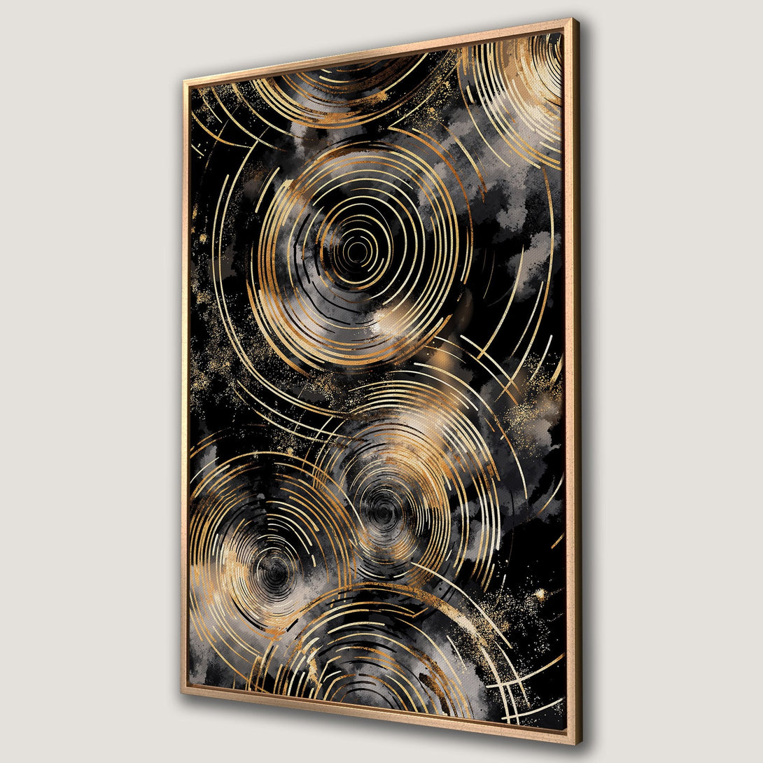 Framed Wall Art featuring an abstract design of gold concentric circles on a black and gray background. Modern art for your home decor.