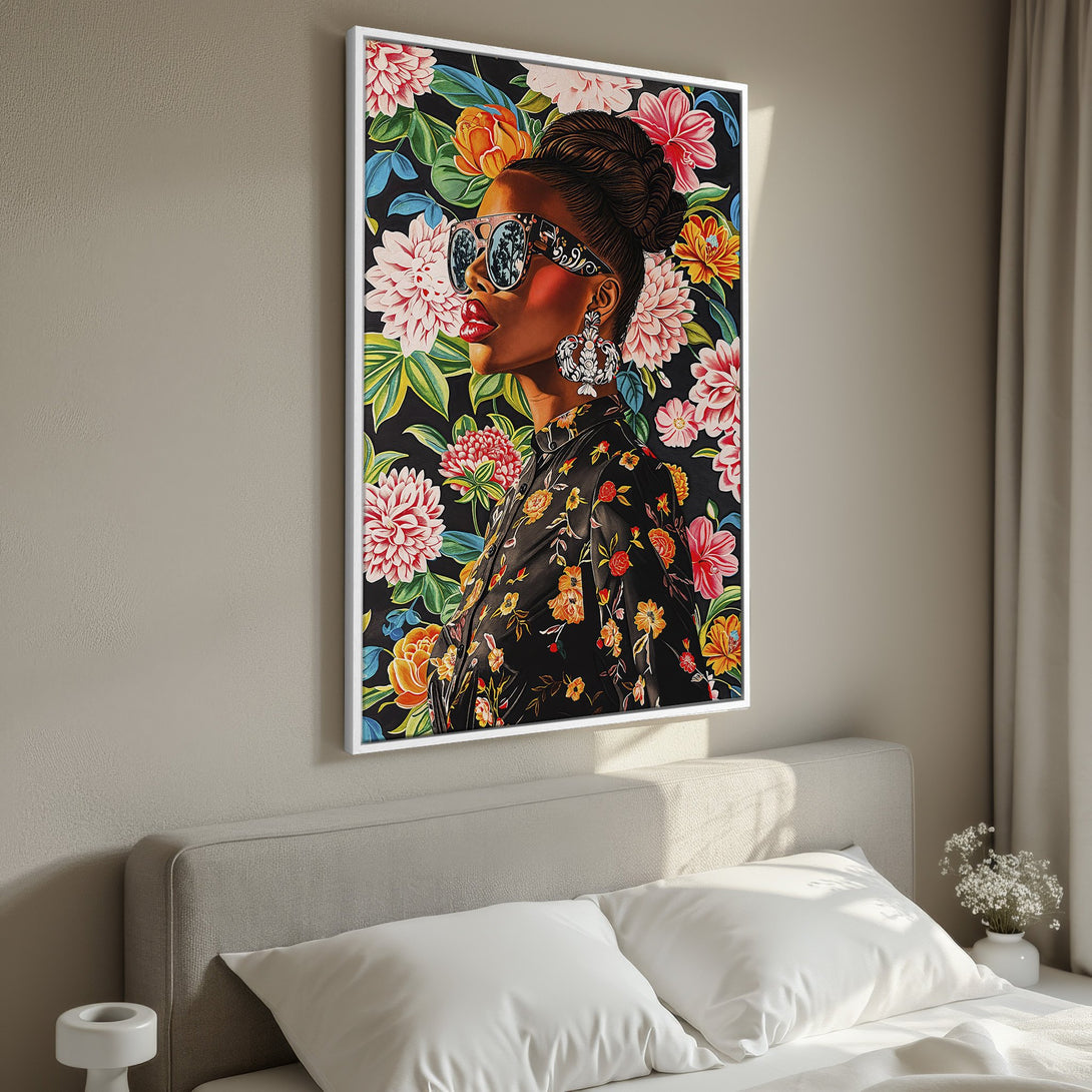 Framed Wall Art: Stylish woman portrait with floral background. Bold colors on black canvas print, perfect for bedroom decor. Add a touch of elegance!