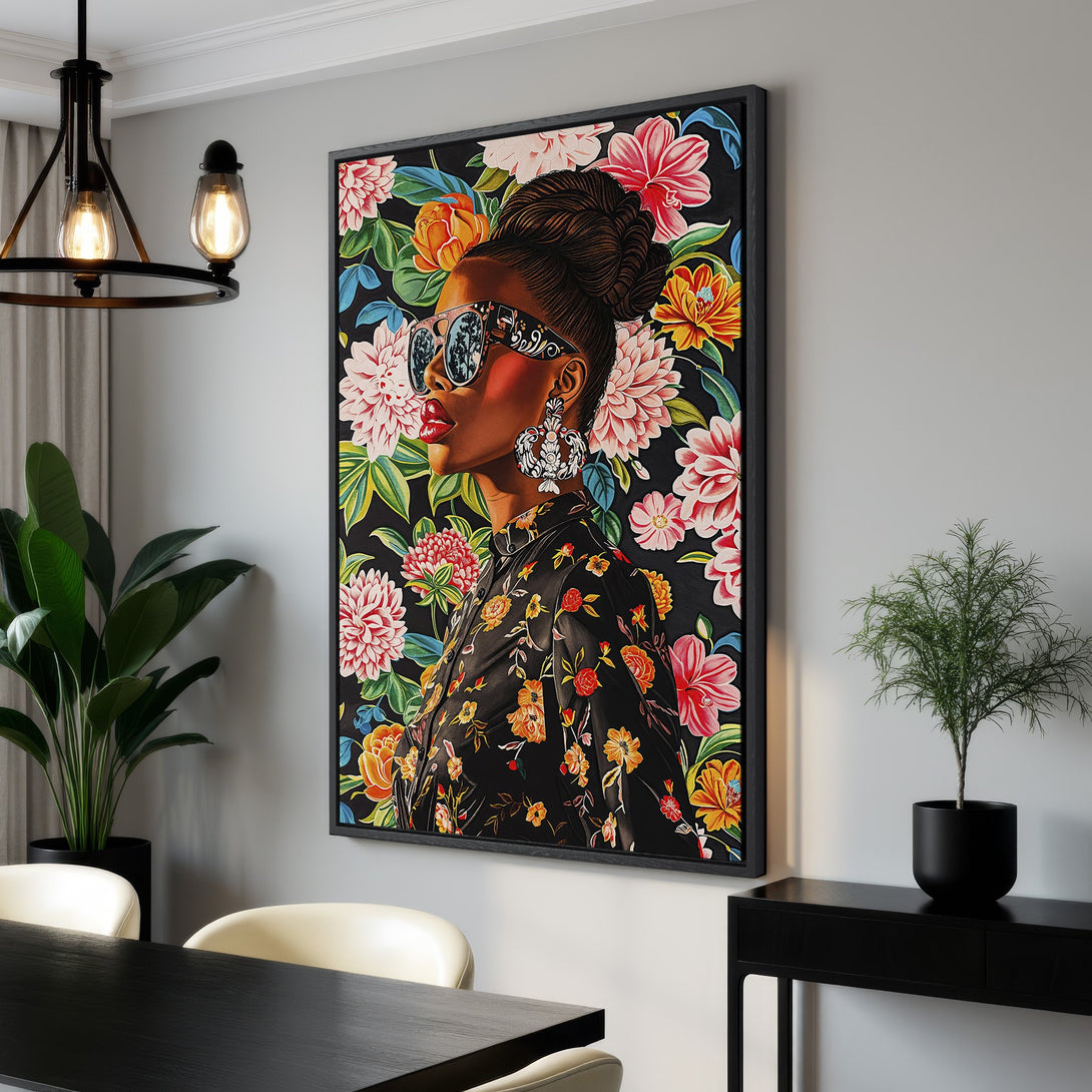 Framed Wall Art featuring a stylish woman with floral background. Vibrant colors pop against a black backdrop, perfect for adding flair to any space.
