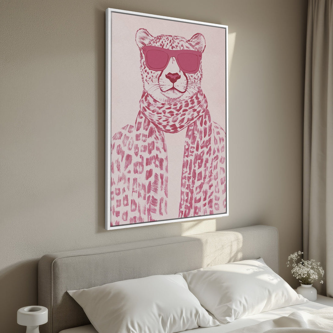Framed Wall Art: Stylish cheetah print canvas art in pink tones. Modern animal print wall decor for a chic bedroom.