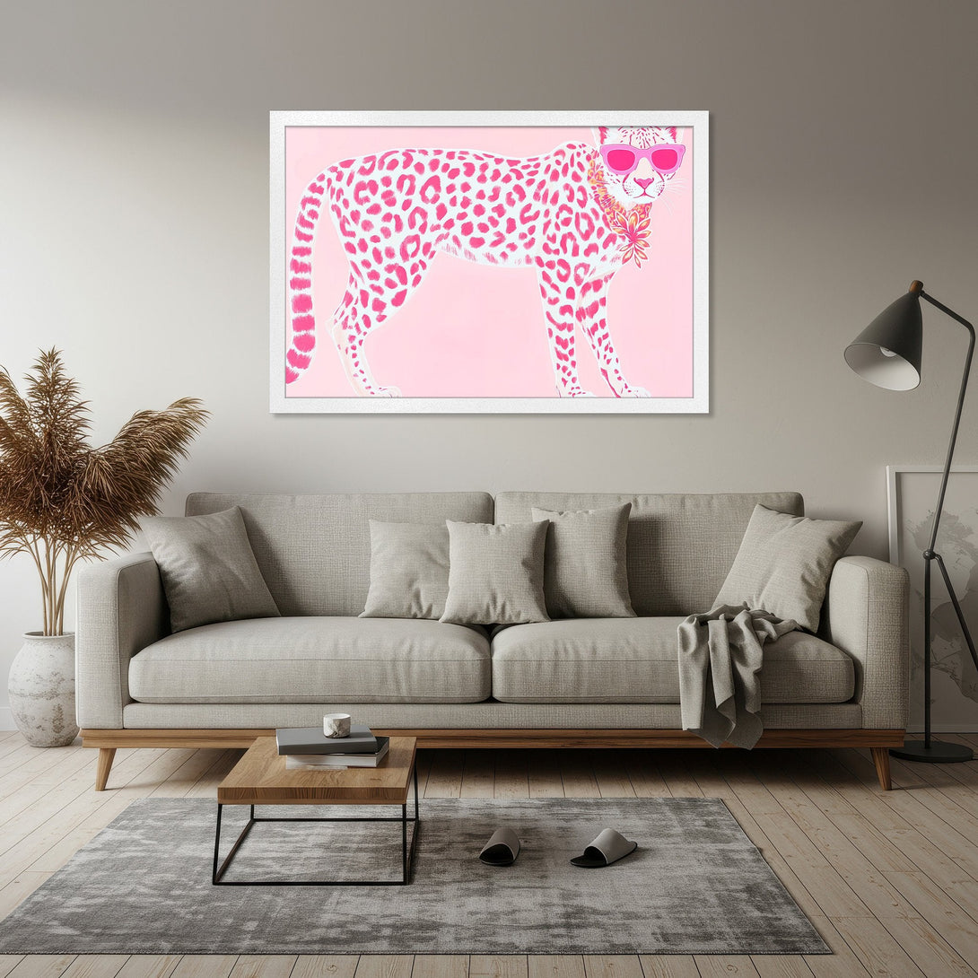 Framed Poster featuring a stylish pink cheetah with sunglasses. Pop art style, pink and white color palette. Add a touch of fun to your home!