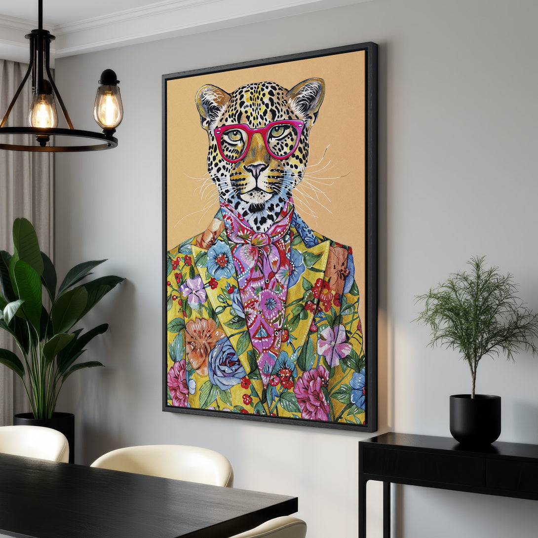 Framed Wall Art: Stylish leopard in glasses & floral suit. Vibrant yellow, pink, & blue palette. Perfect for a modern interior. Shop this unique canvas print!