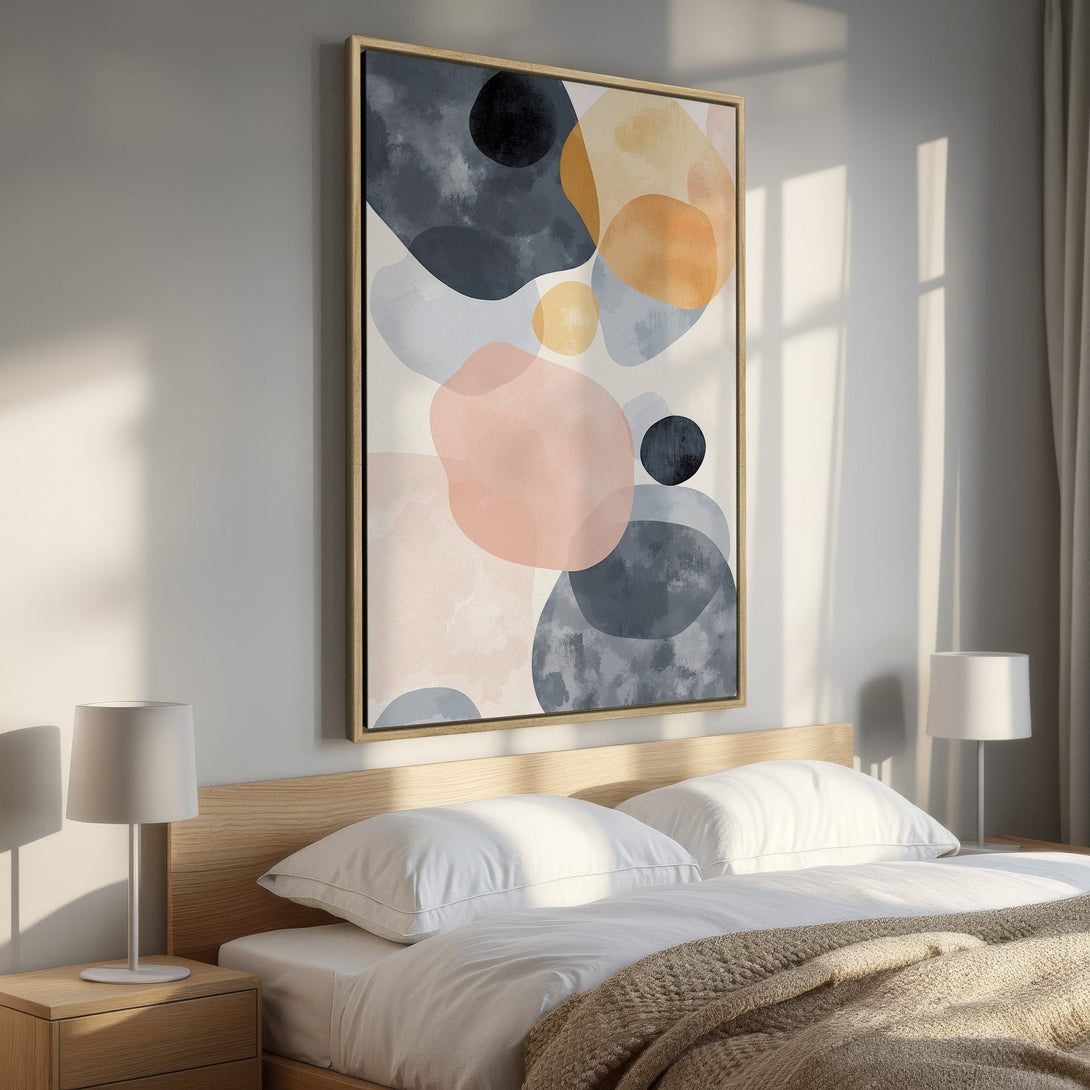 Framed Wall Art: Abstract art canvas print with organic shapes in blush, navy, and ochre tones. Modern bedroom decor.