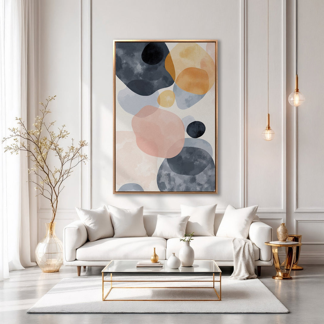 Framed Wall Art: Abstract watercolor art in a modern living room. Features a muted color palette of blush, navy, and gold. Perfect for home decor.