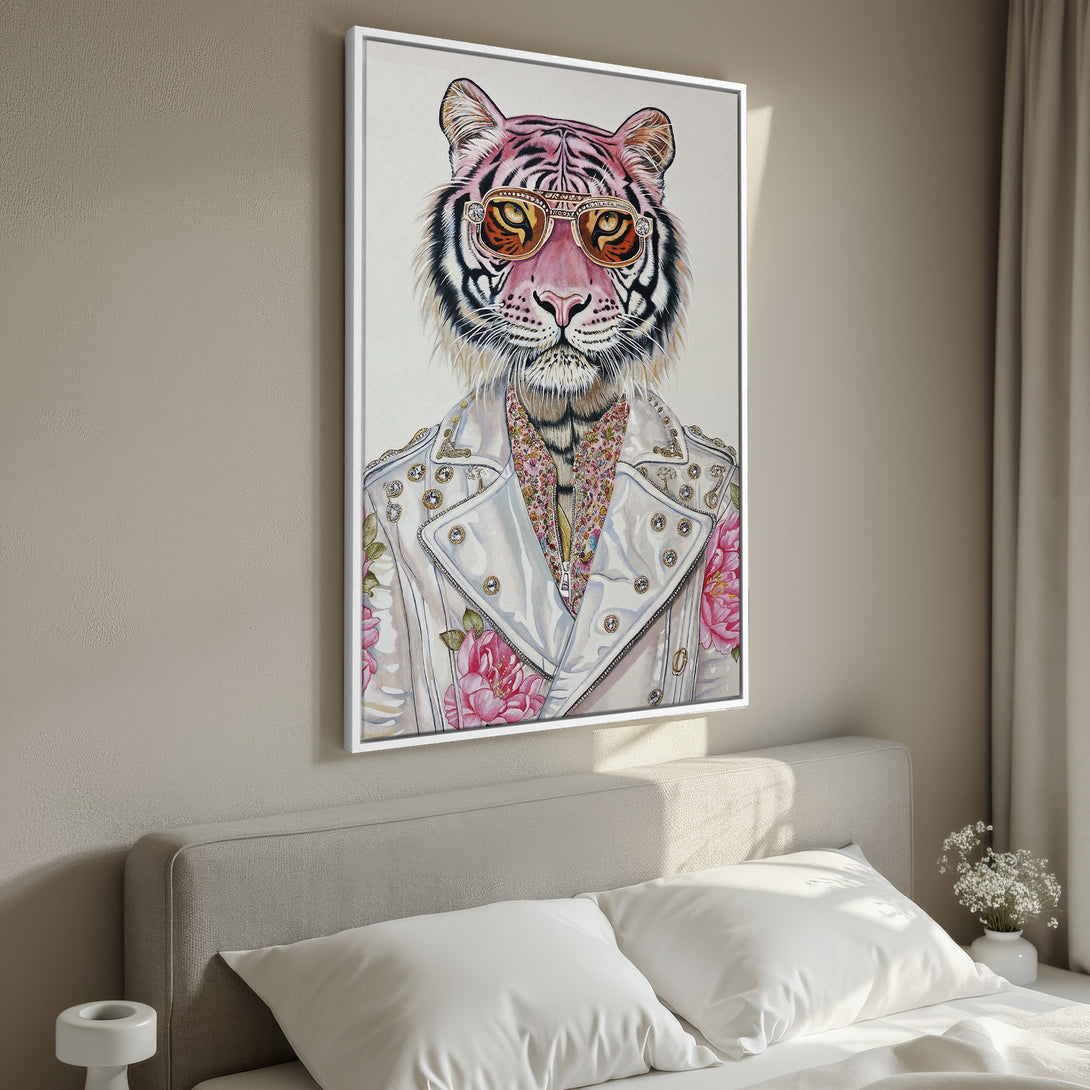 Framed Wall Art: Stylish tiger portrait in sunglasses, vibrant pink and white floral accents, displayed in a modern bedroom with neutral tones. Perfect wall decor!