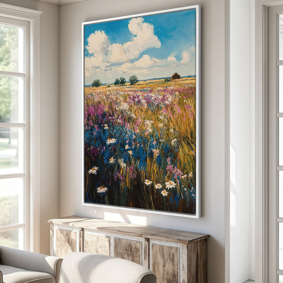 Framed Wall Art of a vibrant wildflower field under a bright blue sky. Impressionistic style with a colorful palette of blues, purples, and yellows.