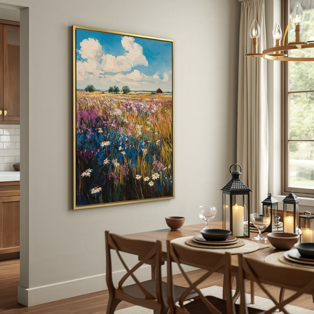Canvas Print of a vibrant wildflower field painting with blue sky and clouds. Warm, earthy tones create a cozy, inviting aesthetic.