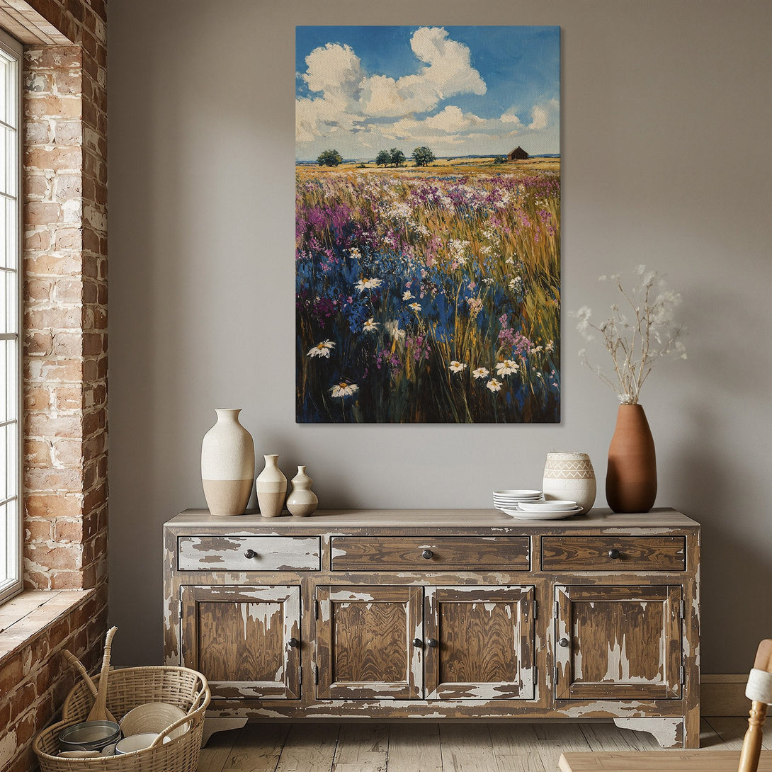 Framed Wall Art: Impressionist painting of a wildflower field with blue, purple, and yellow hues. Adds a touch of nature and color to any interior space.