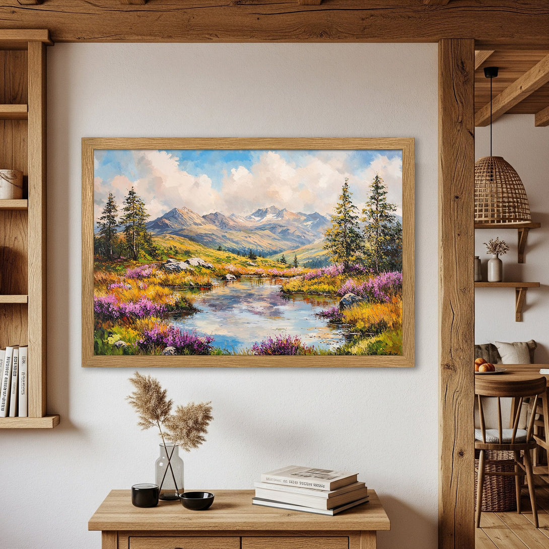 Framed Poster of a vibrant landscape painting. Features mountains, lake, and colorful wildflowers. Warm, natural color palette. Perfect wall art!