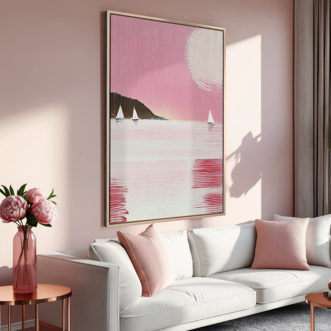 Framed Wall Art: Abstract seascape canvas print in pink and white, displayed in a modern living room. Coastal art with a soft, feminine color palette.