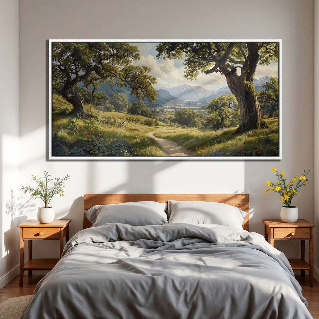 Framed Wall Art: Serene landscape Canvas Print with a path through a green meadow, featuring trees & mountains. Earthy tones create a calming aesthetic.