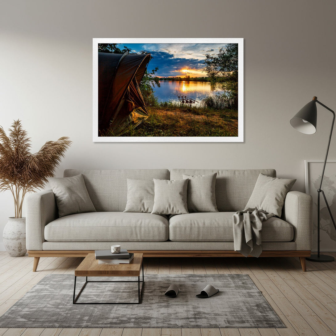 Framed Poster of a serene lake scene at sunset. Neutral tones with pops of orange and blue. Perfect wall art for any room.