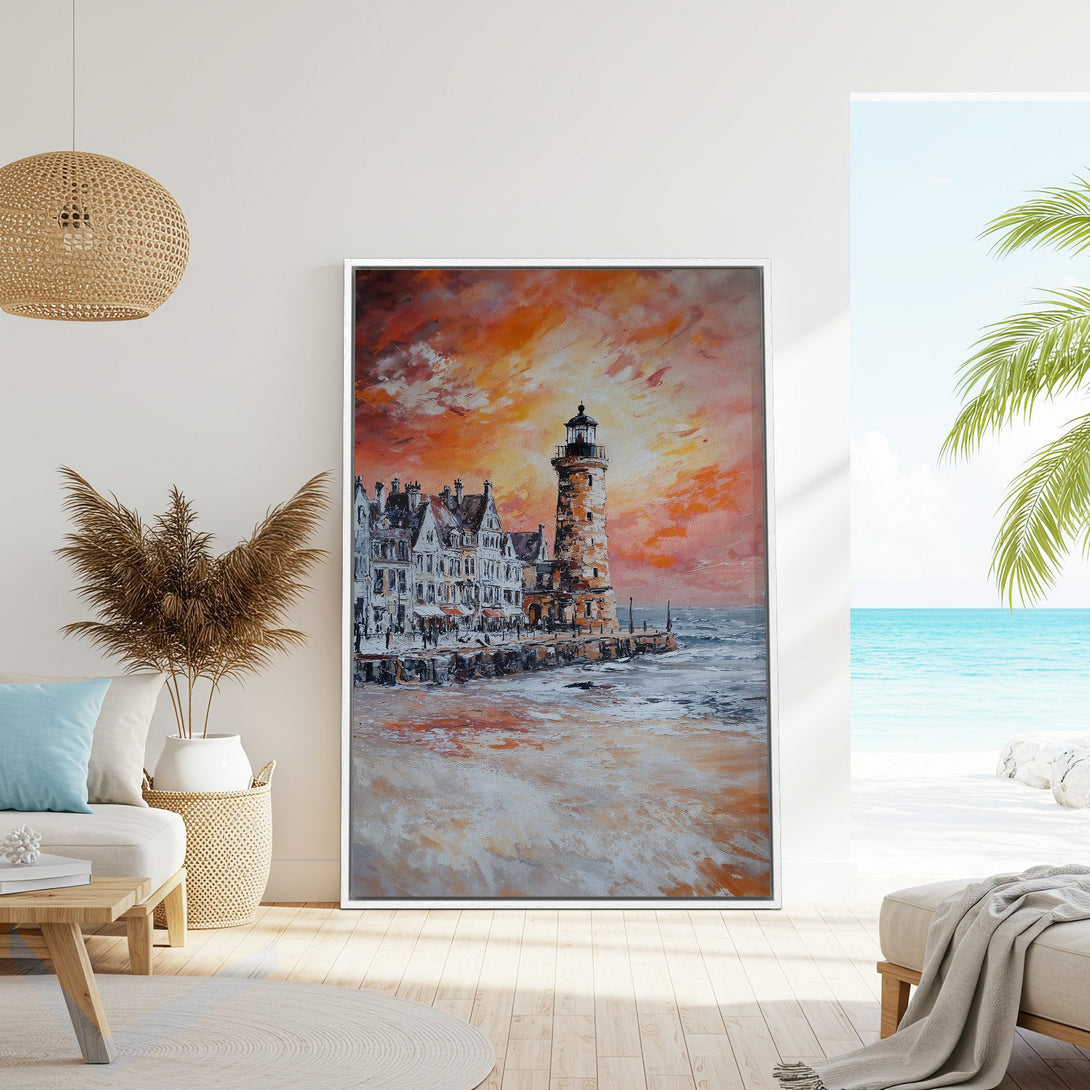Framed Wall Art: Coastal lighthouse painting with warm orange & red sunset sky. Perfect wall decor for a cozy, beachy living room.