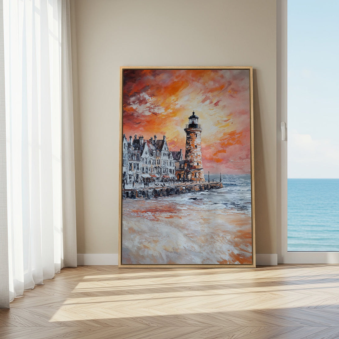 Framed Wall Art: Lighthouse painting with warm orange and red sunset colors. Coastal art for home decor. Add a touch of art to your space.