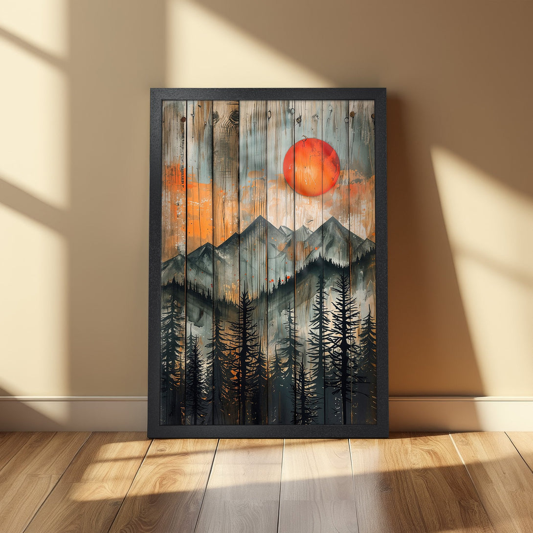 Framed Poster featuring a mountain landscape with a vibrant orange sun, rustic style, and a muted color palette.