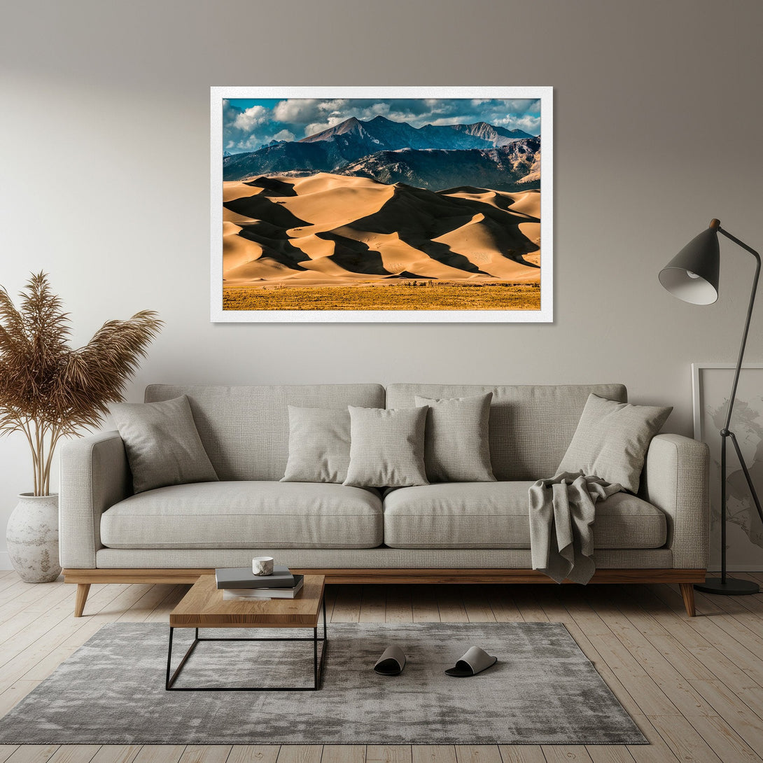 Framed Poster of desert landscape with mountains, warm tones. Perfect wall art for modern home decor.