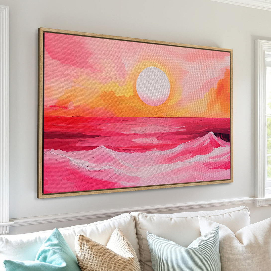 Framed Wall Art featuring a vibrant sunset over the ocean. Abstract style with a warm pink and orange color palette, perfect for adding a pop of color to your home.