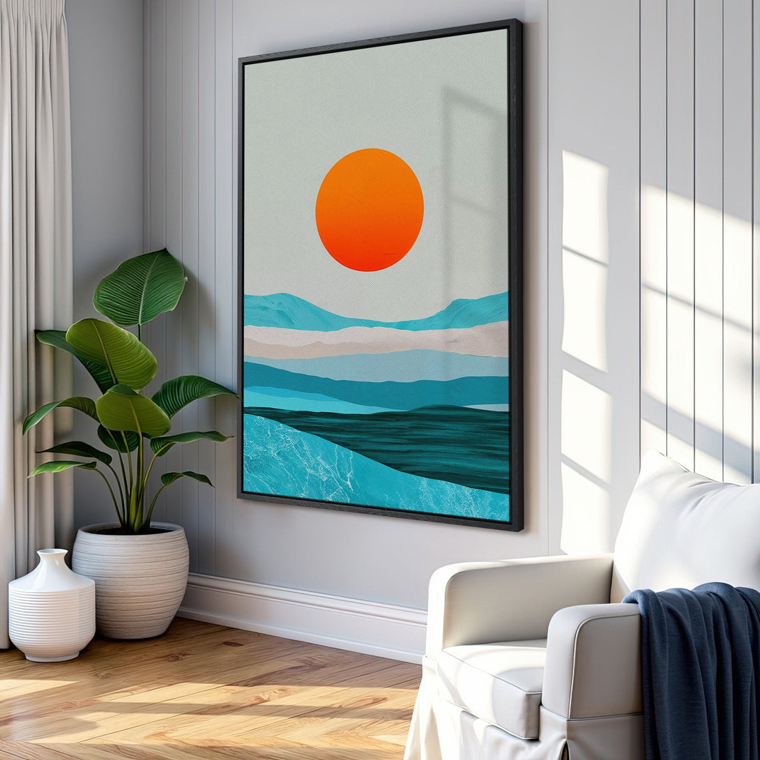 Framed Wall Art featuring an abstract landscape with an orange sun and blue tones. Modern art Canvas Print adds a pop of color to any interior.