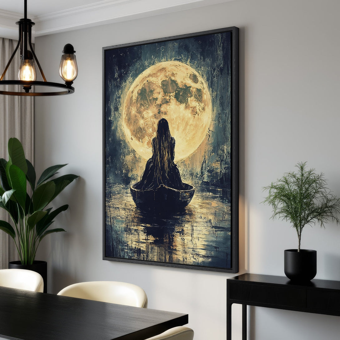 Framed Wall Art: Moody painting of a woman in a boat under a full moon. Dark, ethereal style with a blue and gold color palette. Perfect for modern decor.